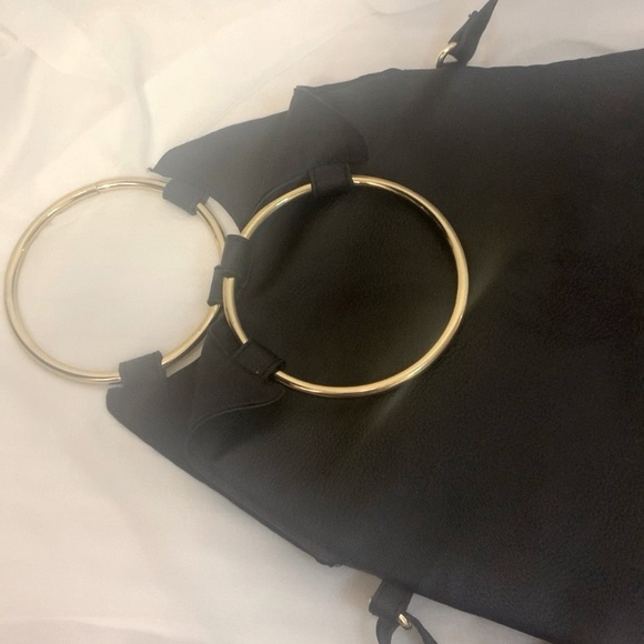 Black Leather Crossbody Purse/Bag with gold metal hoop handles - Picture 8 of 10